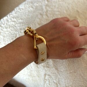 Leather and gold hardware bracelet.
